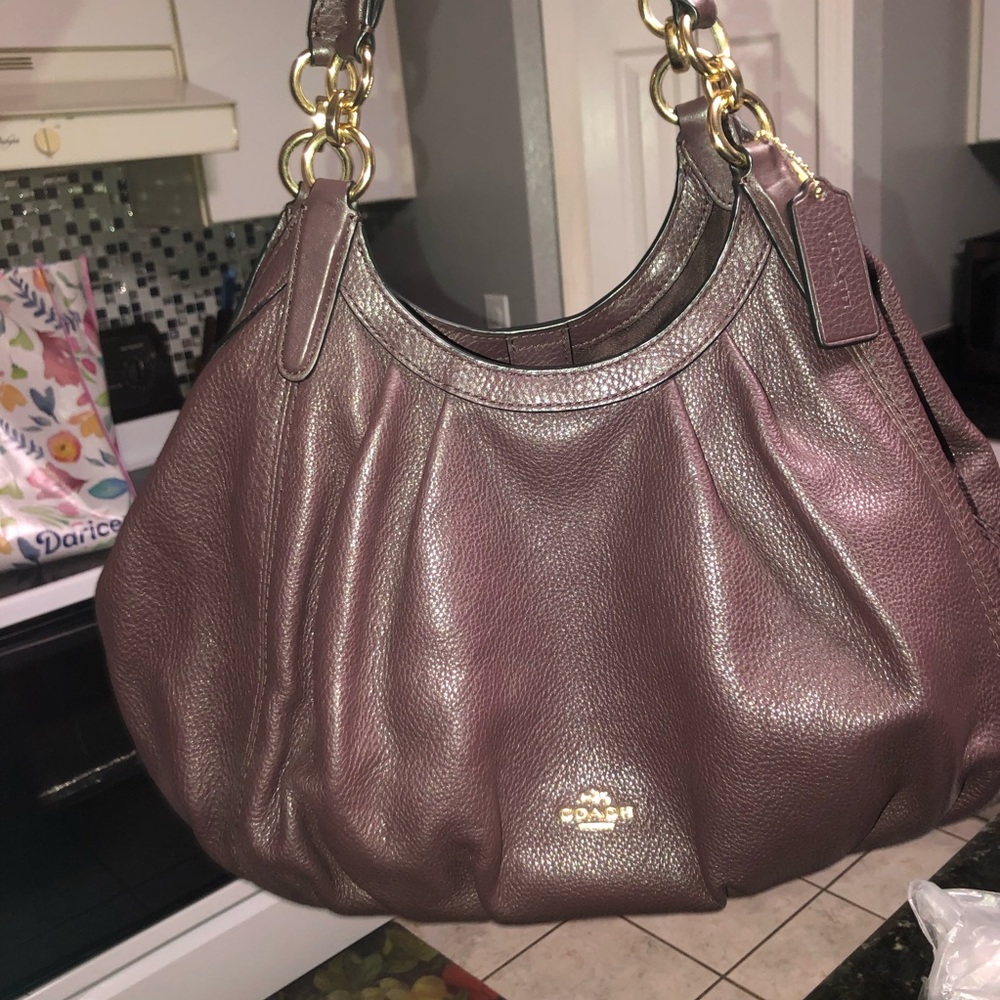 Oxblood coach shoulder bag